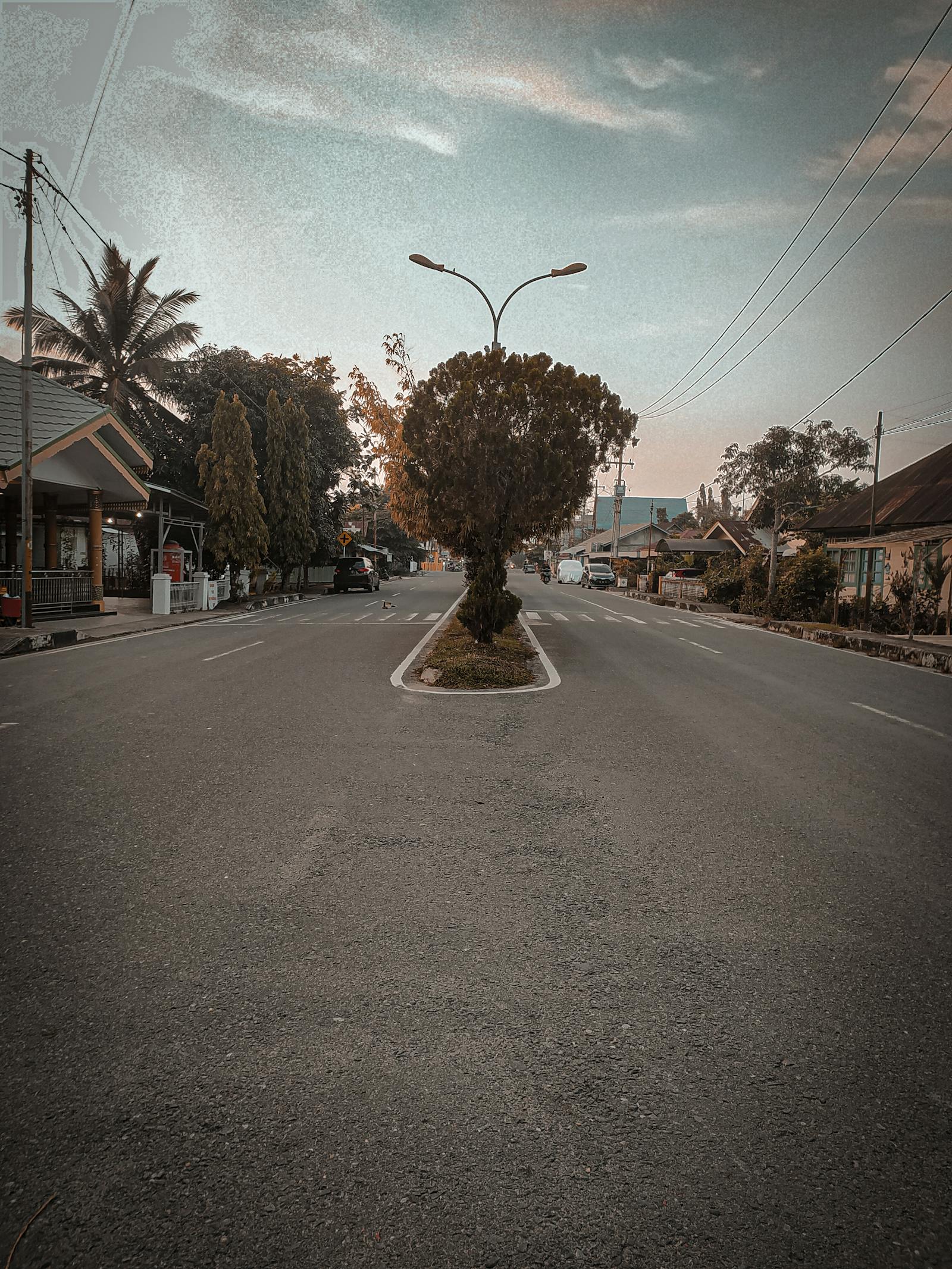 Woman filming short-form video content with a smartphone on a small tripod